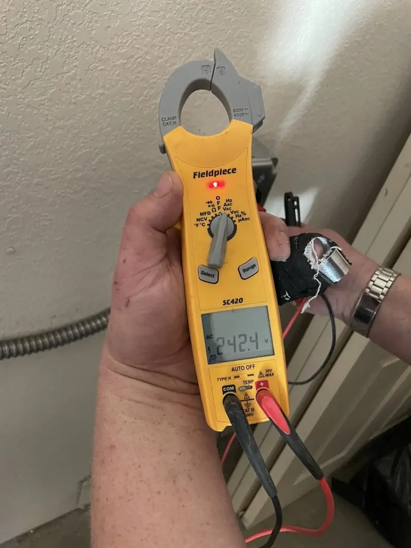 Voltage testing with clamp meter during Generator Installation in Double Oak